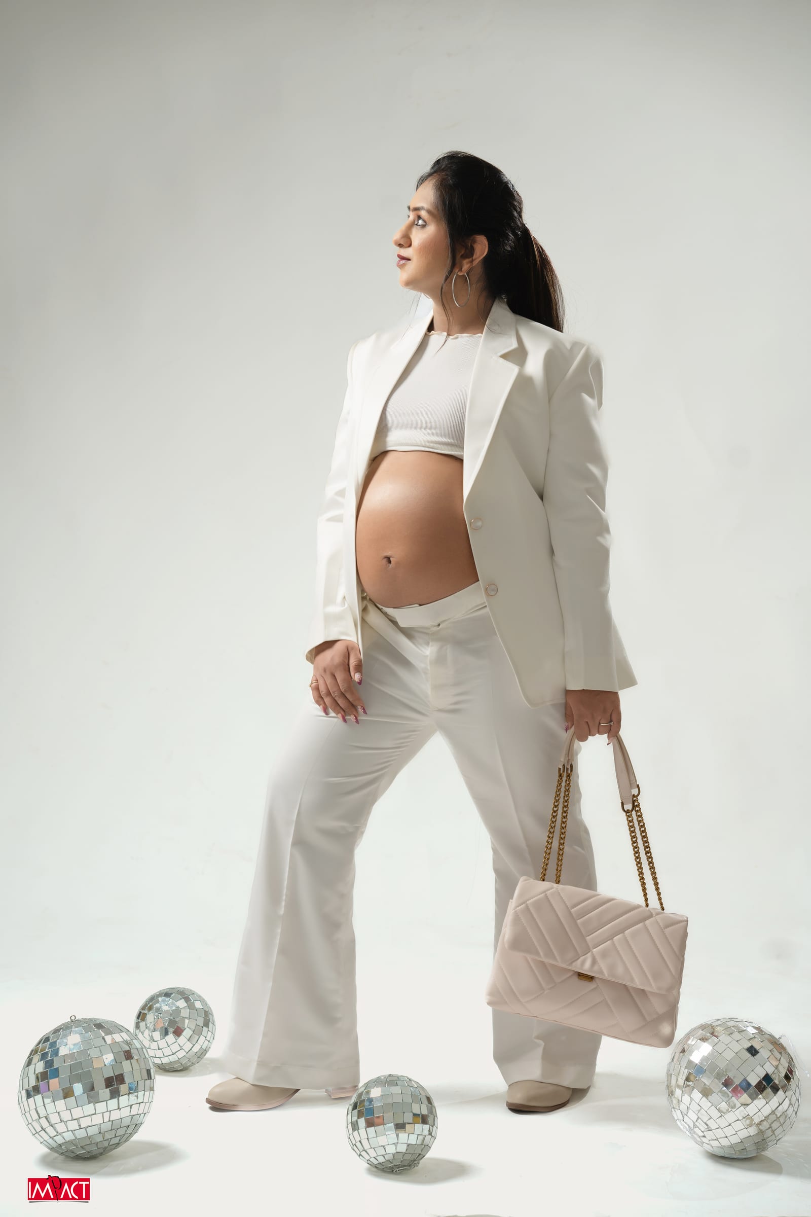 Maternity photographed by Impact Photo Studio