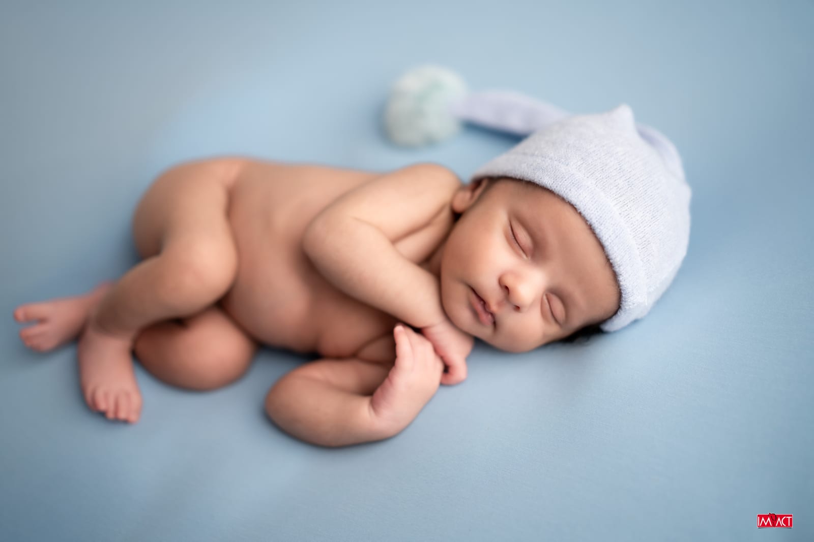 Newborn photography by Impact Photo Studio